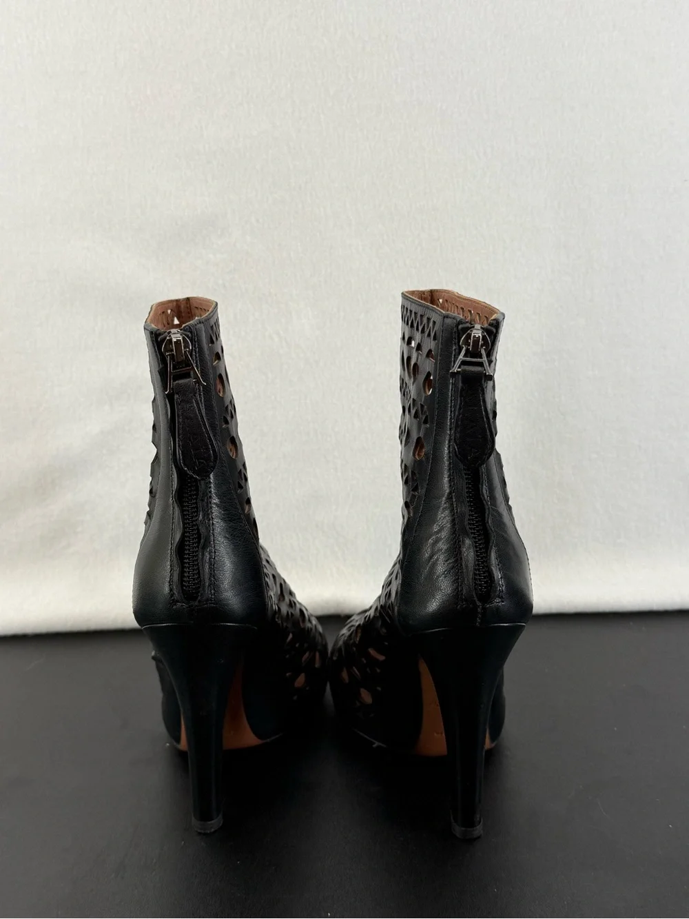 Alaia Black Laser-Cut Leather Ankle Booties
